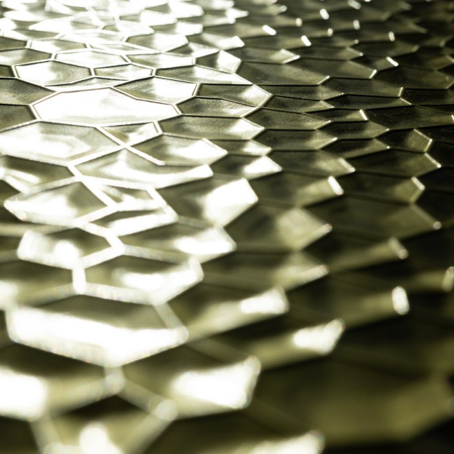 Falpanel dombornyomott bronz